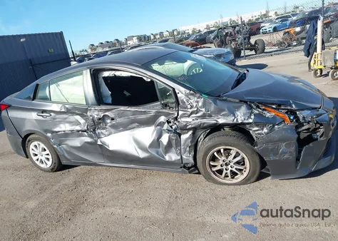 2021 Toyota Prius L Eco from USA, damaged, VIN JTDKAMFU6M3153168